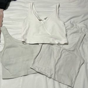 white tank top trio